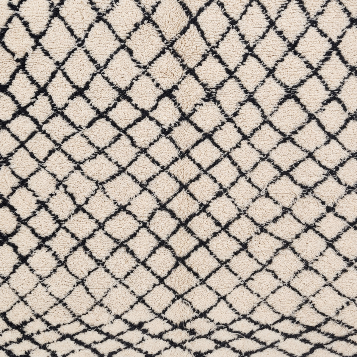 Maglia - detail van dessin en afwerking met afgestemde achtergrond en belichting