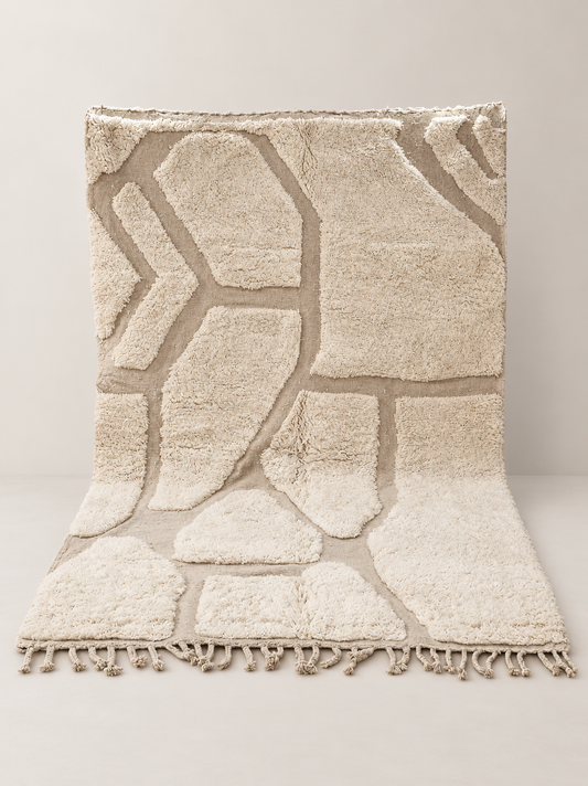 Isola - hand-knotted wool rug on a light beige background