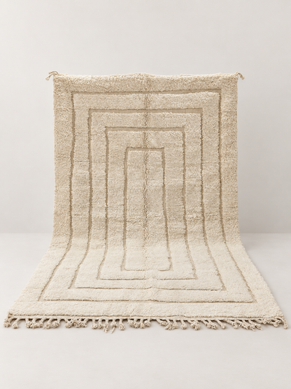 Portico - handgeknoopt wollen vloerkleed op een lichte beige achtergrond