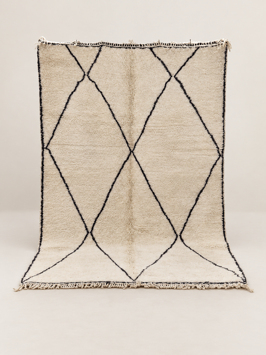 Vertice - hand-knotted wool rug on a light beige background